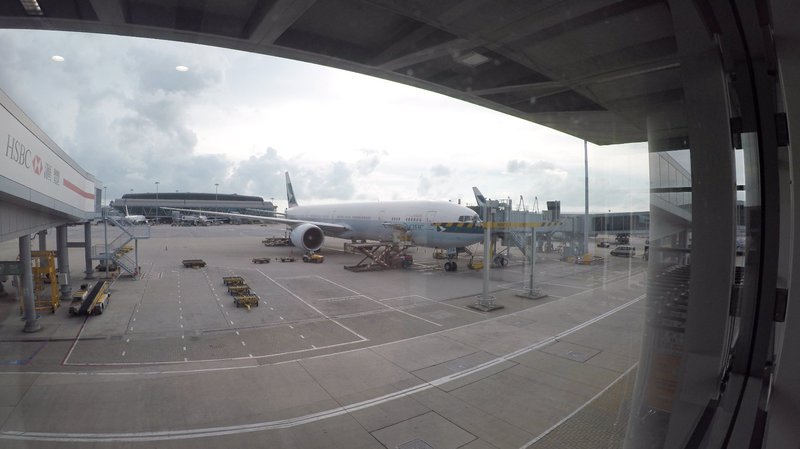 Our Cathay Pacific Boeing 777-300ER parked up at the gate in Hong Kong.